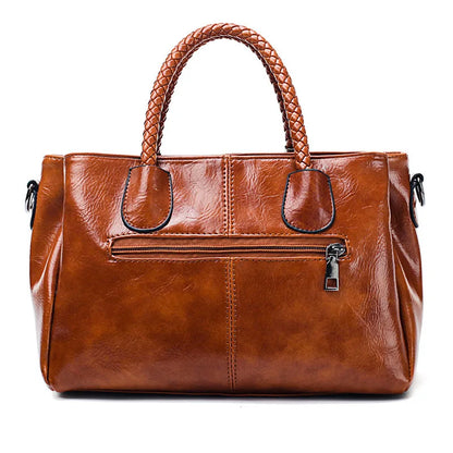 Giana | Elegant Leather Handbag with Woven Handle